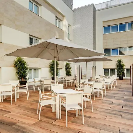 Отель Sercotel Coliseo