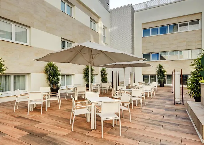 Отель Sercotel Coliseo